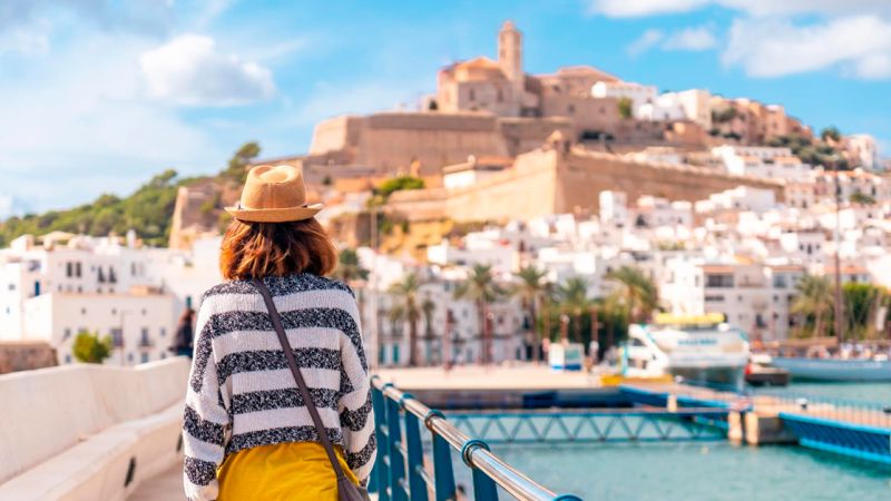 Woman walking in Ibiza in winter